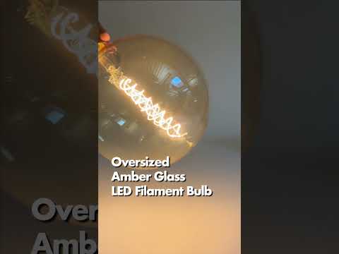 Feit Electric 6.5W [60W Equivalent] G63 E26 Base Dimmable Spiral Filament Amber Glass Vintage Edison LED Light Bulb Warm White (G63/S/820/LED) Video